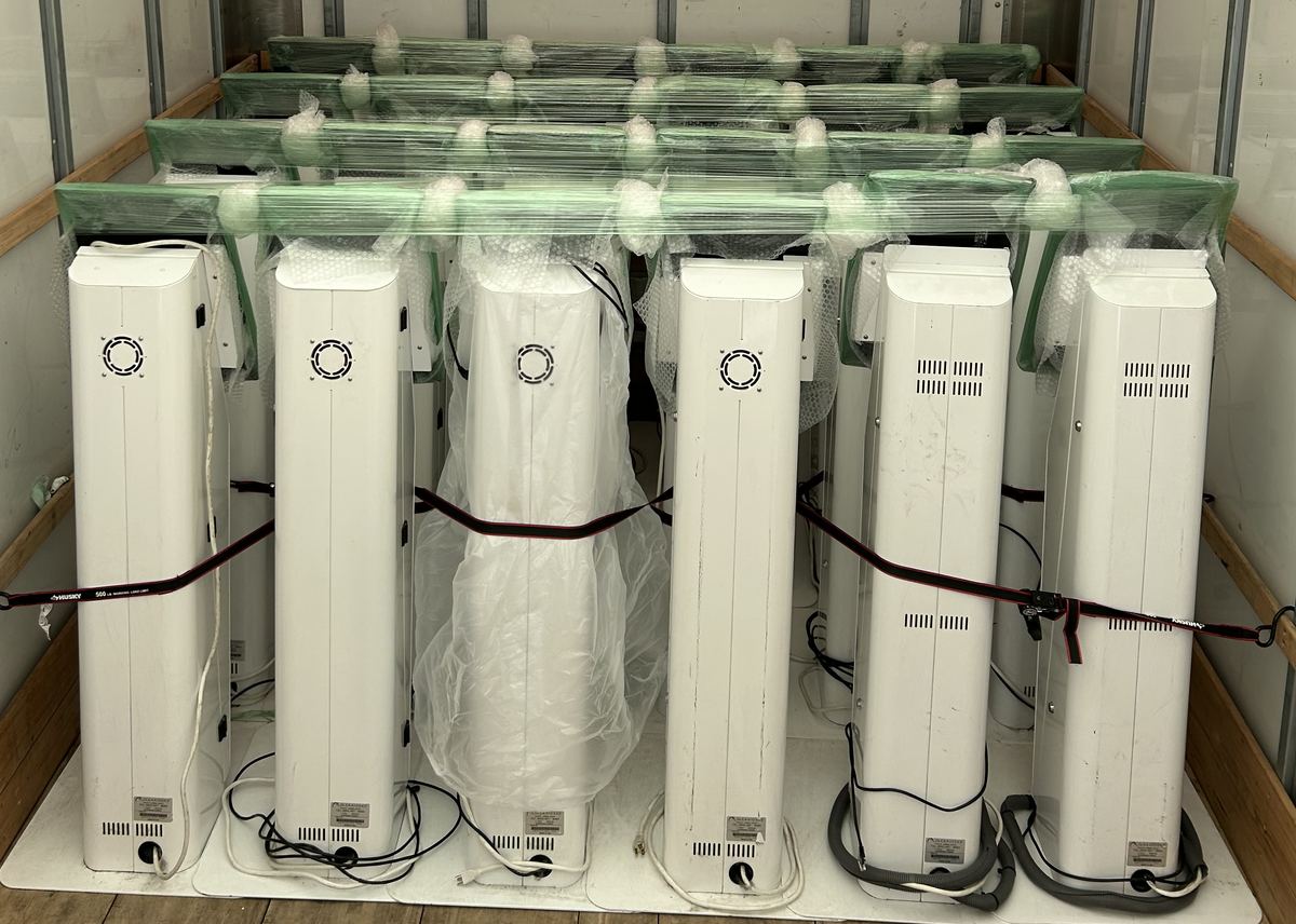 A truck loaded with Austin freestanding kiosks, wrapped and ready to ship